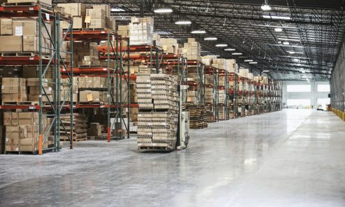 cardboard-boxes-on-shelves-in-warehouse.jpg